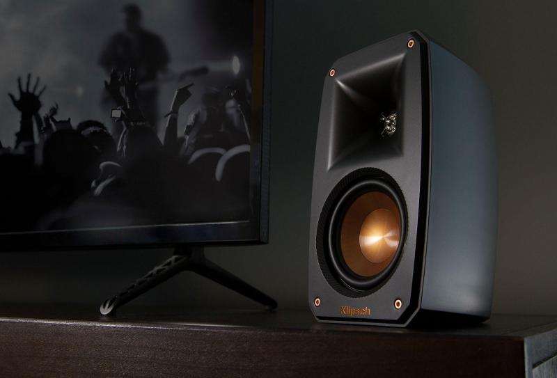 Reference Theater Pack Speaker next to screen
